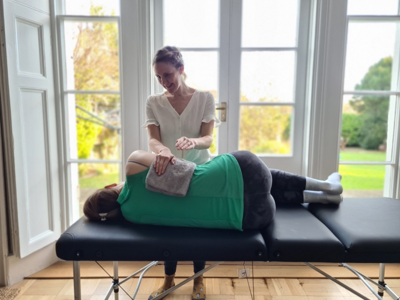Patient receiving airway clearance treatment by lucy at take a breath physio